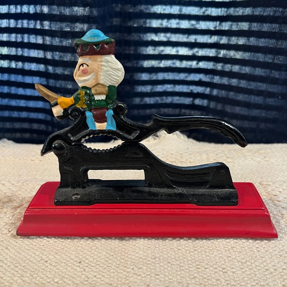Vintage Cast Iron Nutcracker on Red‎ Wood Base Hand Painted Decor